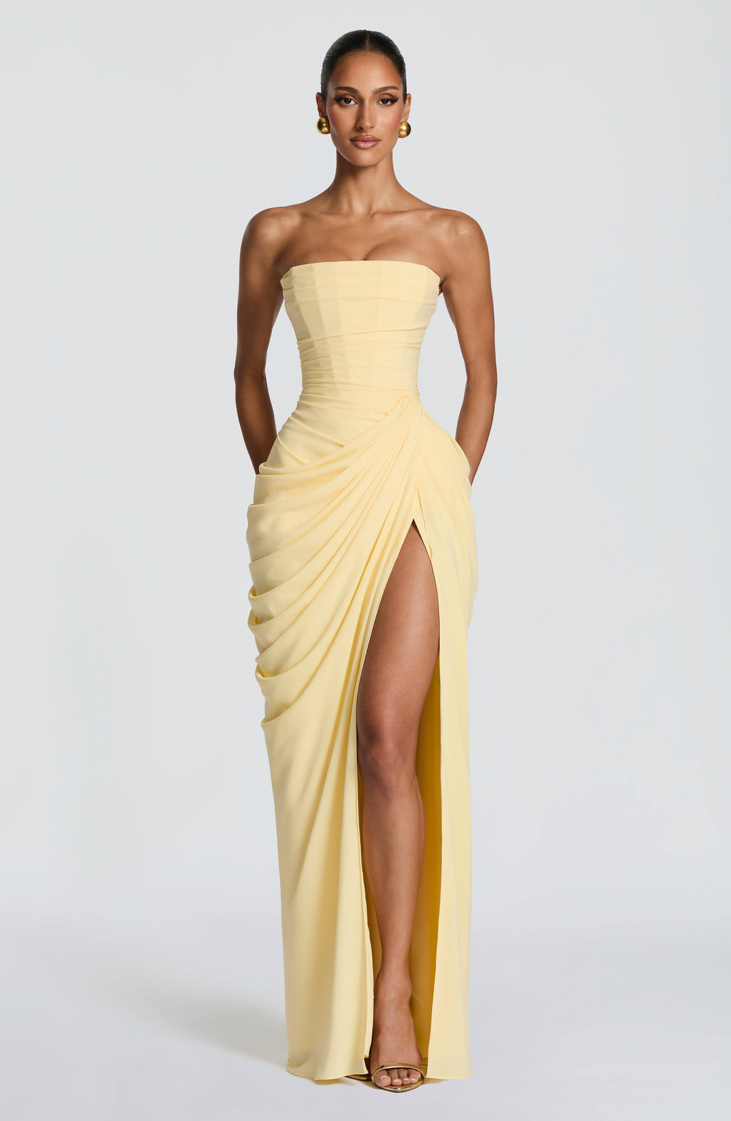 Flōre | Sculpturale Avondjurk met Corset en Drapering Geel